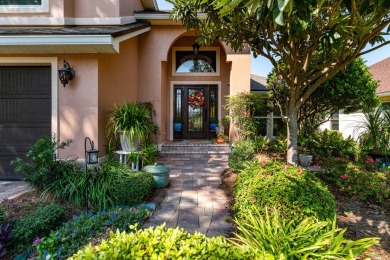 This inviting home, nestled on a small lake along the 3rd on Shalimar Pointe Golf and Country Club in Florida - for sale on GolfHomes.com, golf home, golf lot