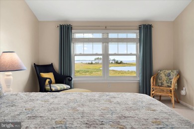 Direct bay views abound from this beautiful 2-story condo in on Bethany Bay Golf Club in Delaware - for sale on GolfHomes.com, golf home, golf lot