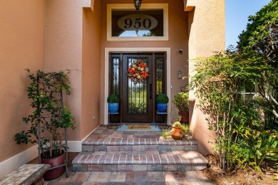 This inviting home, nestled on a small lake along the 3rd on Shalimar Pointe Golf and Country Club in Florida - for sale on GolfHomes.com, golf home, golf lot