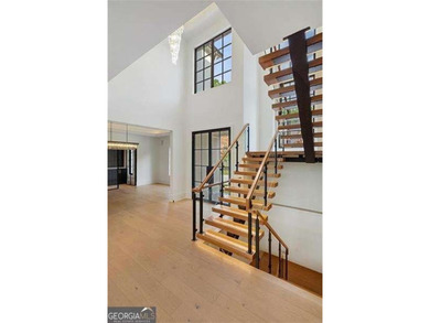 Welcome to a statement home in the prestigious Echelon community on Echelon Golf Club in Georgia - for sale on GolfHomes.com, golf home, golf lot