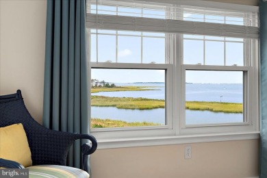 Direct bay views abound from this beautiful 2-story condo in on Bethany Bay Golf Club in Delaware - for sale on GolfHomes.com, golf home, golf lot