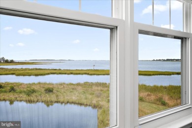 Direct bay views abound from this beautiful 2-story condo in on Bethany Bay Golf Club in Delaware - for sale on GolfHomes.com, golf home, golf lot