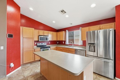 Immaculate 4-bedroom residence featuring an inviting open floor on Dave White Reg Park and Golf Course in Arizona - for sale on GolfHomes.com, golf home, golf lot