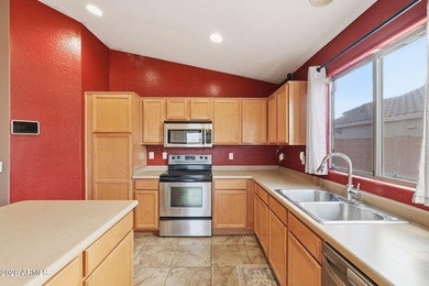 Immaculate 4-bedroom residence featuring an inviting open floor on Dave White Reg Park and Golf Course in Arizona - for sale on GolfHomes.com, golf home, golf lot