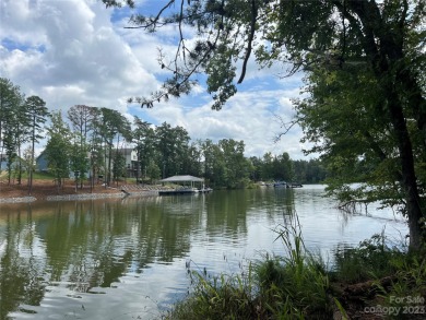This private cul-de-sac waterfront lot features an unprecedented on Edgewater Golf Club in South Carolina - for sale on GolfHomes.com, golf home, golf lot