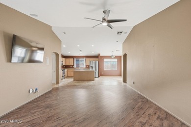 Immaculate 4-bedroom residence featuring an inviting open floor on Dave White Reg Park and Golf Course in Arizona - for sale on GolfHomes.com, golf home, golf lot