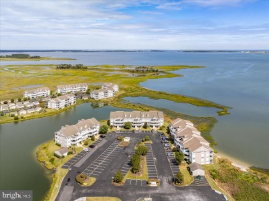 Direct bay views abound from this beautiful 2-story condo in on Bethany Bay Golf Club in Delaware - for sale on GolfHomes.com, golf home, golf lot