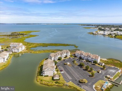 Direct bay views abound from this beautiful 2-story condo in on Bethany Bay Golf Club in Delaware - for sale on GolfHomes.com, golf home, golf lot
