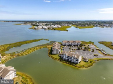 Direct bay views abound from this beautiful 2-story condo in on Bethany Bay Golf Club in Delaware - for sale on GolfHomes.com, golf home, golf lot