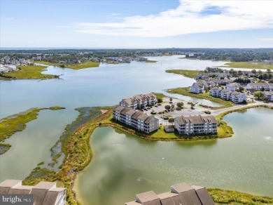 Direct bay views abound from this beautiful 2-story condo in on Bethany Bay Golf Club in Delaware - for sale on GolfHomes.com, golf home, golf lot