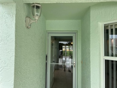 Enjoy this piece of paradise with this beautifully appointed 2 on Sabal Trace Golf and Country Club in Florida - for sale on GolfHomes.com, golf home, golf lot
