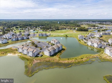 Direct bay views abound from this beautiful 2-story condo in on Bethany Bay Golf Club in Delaware - for sale on GolfHomes.com, golf home, golf lot