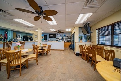 Welcome home to 877 Queensway Road South in award winning Maple on Maple Leaf Golf and Country Club in Florida - for sale on GolfHomes.com, golf home, golf lot