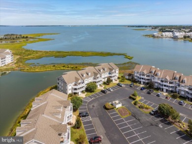 Direct bay views abound from this beautiful 2-story condo in on Bethany Bay Golf Club in Delaware - for sale on GolfHomes.com, golf home, golf lot