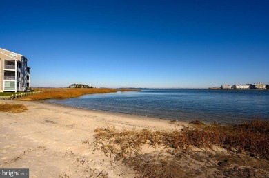 Direct bay views abound from this beautiful 2-story condo in on Bethany Bay Golf Club in Delaware - for sale on GolfHomes.com, golf home, golf lot