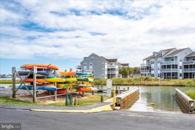 Direct bay views abound from this beautiful 2-story condo in on Bethany Bay Golf Club in Delaware - for sale on GolfHomes.com, golf home, golf lot