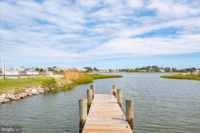 Direct bay views abound from this beautiful 2-story condo in on Bethany Bay Golf Club in Delaware - for sale on GolfHomes.com, golf home, golf lot