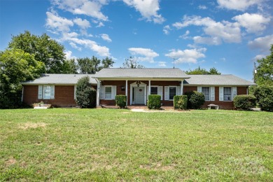 Over 9 acres of beautiful pasture with gentle rolling hills on Woodbridge Golf Links in North Carolina - for sale on GolfHomes.com, golf home, golf lot