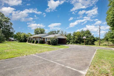 Over 9 acres of beautiful pasture with gentle rolling hills on Woodbridge Golf Links in North Carolina - for sale on GolfHomes.com, golf home, golf lot