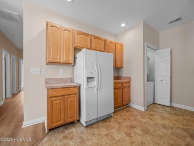 This thoughtfully designed 3-bedroom, 2-bath single-level condo on Brandywine Bay Golf Club in North Carolina - for sale on GolfHomes.com, golf home, golf lot