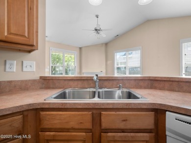 This thoughtfully designed 3-bedroom, 2-bath single-level condo on Brandywine Bay Golf Club in North Carolina - for sale on GolfHomes.com, golf home, golf lot