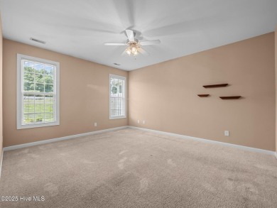 This thoughtfully designed 3-bedroom, 2-bath single-level condo on Brandywine Bay Golf Club in North Carolina - for sale on GolfHomes.com, golf home, golf lot