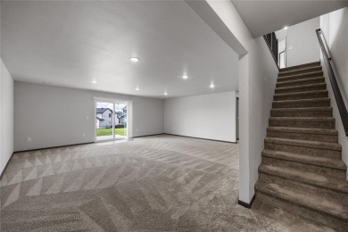 Nestled within an up-and-coming, expanding development in West on Fox Run Golf and Country Club in Iowa - for sale on GolfHomes.com, golf home, golf lot