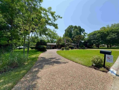 Welcome to 9754 Quail Hollow, situated on the 15th fairway of on Scenic Hills Country Club in Florida - for sale on GolfHomes.com, golf home, golf lot