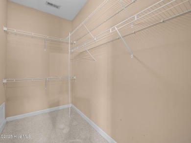 This thoughtfully designed 3-bedroom, 2-bath single-level condo on Brandywine Bay Golf Club in North Carolina - for sale on GolfHomes.com, golf home, golf lot