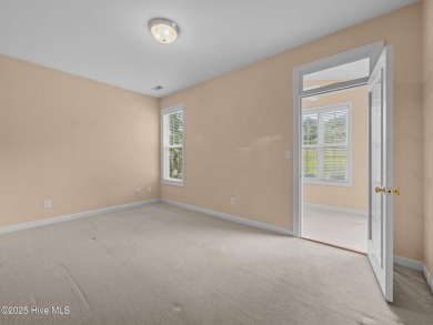This thoughtfully designed 3-bedroom, 2-bath single-level condo on Brandywine Bay Golf Club in North Carolina - for sale on GolfHomes.com, golf home, golf lot