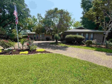 Welcome to 9754 Quail Hollow, situated on the 15th fairway of on Scenic Hills Country Club in Florida - for sale on GolfHomes.com, golf home, golf lot