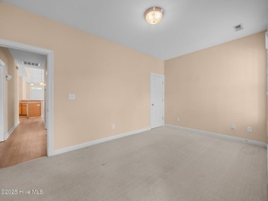 This thoughtfully designed 3-bedroom, 2-bath single-level condo on Brandywine Bay Golf Club in North Carolina - for sale on GolfHomes.com, golf home, golf lot
