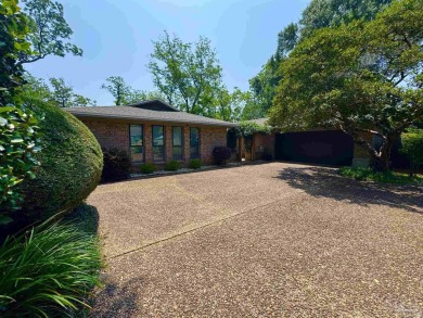 Welcome to 9754 Quail Hollow, situated on the 15th fairway of on Scenic Hills Country Club in Florida - for sale on GolfHomes.com, golf home, golf lot