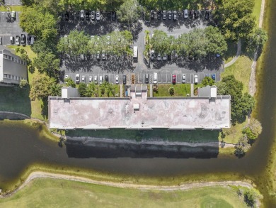 Don't miss this opportunity to own a top-floor 2-bedroom on Grande Oaks Golf Club in Florida - for sale on GolfHomes.com, golf home, golf lot