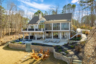 INDULGE IN THE EPITOME OF LAKESIDE LUXURY WITH THIS STUNNING on Reynolds Lake Oconee - Great Waters Course in Georgia - for sale on GolfHomes.com, golf home, golf lot