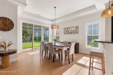 Easy living in this luxury townhome in the highly desirable on Cape Fear National At Brunswick Forest in North Carolina - for sale on GolfHomes.com, golf home, golf lot