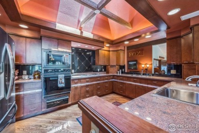 Elegant & Refined Ranch Style Home overlooking the 14th Fairway on Fox Acres Country Club in Colorado - for sale on GolfHomes.com, golf home, golf lot