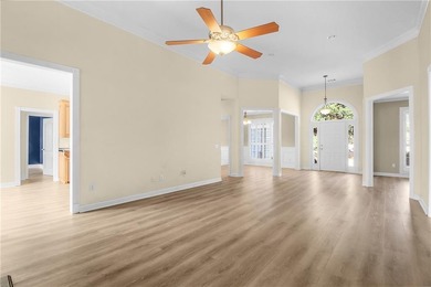 This three bedroom, two and one-half bath home with a marshview on Sapelo Hammock Golf Club in Georgia - for sale on GolfHomes.com, golf home, golf lot