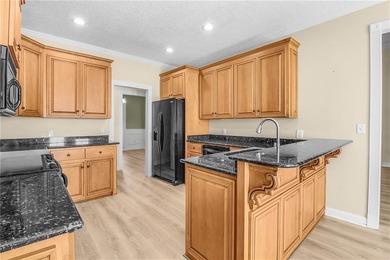 This three bedroom, two and one-half bath home with a marshview on Sapelo Hammock Golf Club in Georgia - for sale on GolfHomes.com, golf home, golf lot