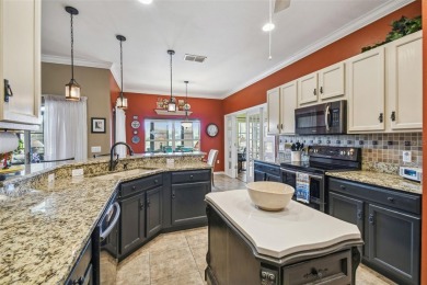 Welcome to this WELL MAINTAINED and BEAUTIFUL Mozart Model in on Stonegate Golf Club in Florida - for sale on GolfHomes.com, golf home, golf lot