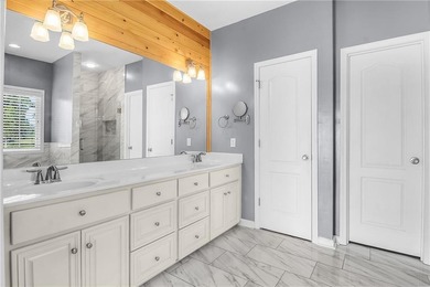 This three bedroom, two and one-half bath home with a marshview on Sapelo Hammock Golf Club in Georgia - for sale on GolfHomes.com, golf home, golf lot