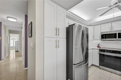 Looking for the perfect blend of comfort, convenience on Saint Andrews South Golf Club in Florida - for sale on GolfHomes.com, golf home, golf lot