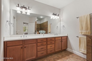 Easy living in this luxury townhome in the highly desirable on Cape Fear National At Brunswick Forest in North Carolina - for sale on GolfHomes.com, golf home, golf lot