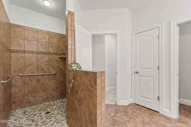 Easy living in this luxury townhome in the highly desirable on Cape Fear National At Brunswick Forest in North Carolina - for sale on GolfHomes.com, golf home, golf lot