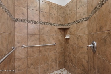 Easy living in this luxury townhome in the highly desirable on Cape Fear National At Brunswick Forest in North Carolina - for sale on GolfHomes.com, golf home, golf lot