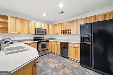 Welcome to this Spacious Multigenerational Home nestled in the on Brookstone Golf and Country Club in Georgia - for sale on GolfHomes.com, golf home, golf lot