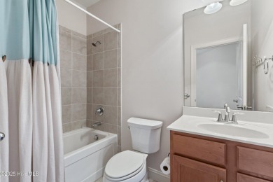 Easy living in this luxury townhome in the highly desirable on Cape Fear National At Brunswick Forest in North Carolina - for sale on GolfHomes.com, golf home, golf lot