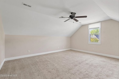 Easy living in this luxury townhome in the highly desirable on Cape Fear National At Brunswick Forest in North Carolina - for sale on GolfHomes.com, golf home, golf lot