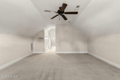 Easy living in this luxury townhome in the highly desirable on Cape Fear National At Brunswick Forest in North Carolina - for sale on GolfHomes.com, golf home, golf lot