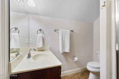 Easy living in this luxury townhome in the highly desirable on Cape Fear National At Brunswick Forest in North Carolina - for sale on GolfHomes.com, golf home, golf lot